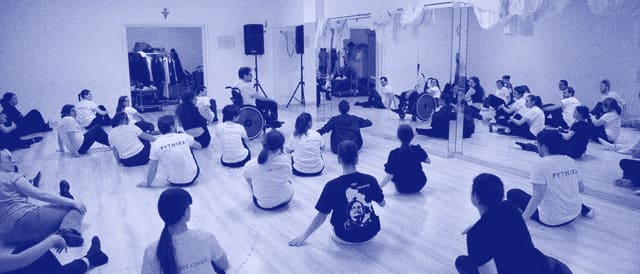 Students sitting in a circle during a workshop