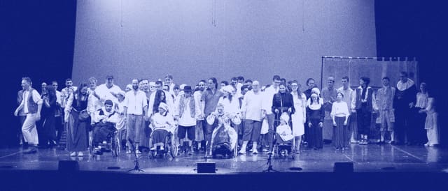 School students wave to the audience at the end of the show