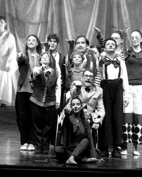 The academy company posing on stage
